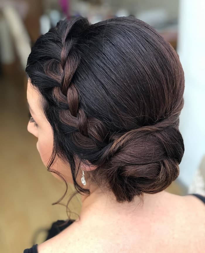 Low braids and in a bun for quinceanera hairstyle