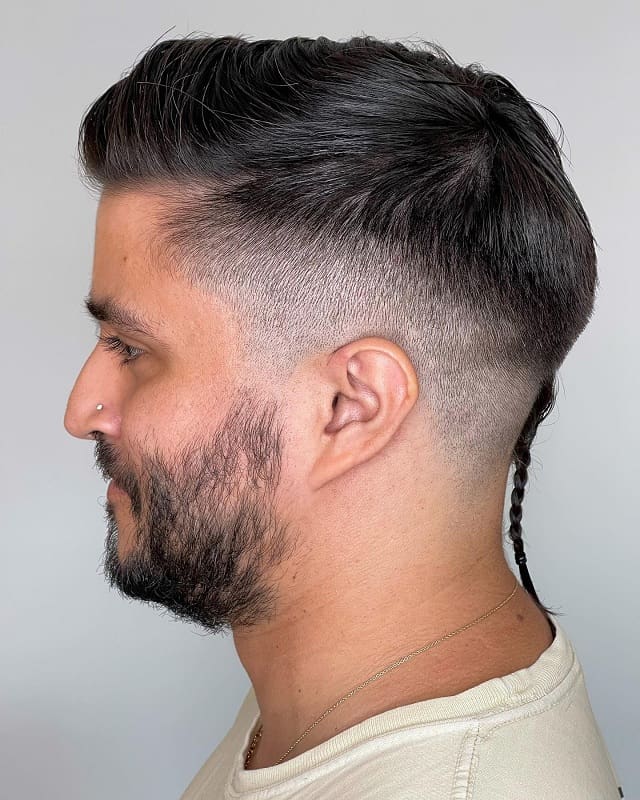 Mid fade and rat tail