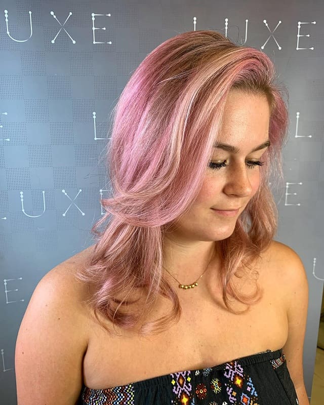 shoulder length blonde hair with pink highlights