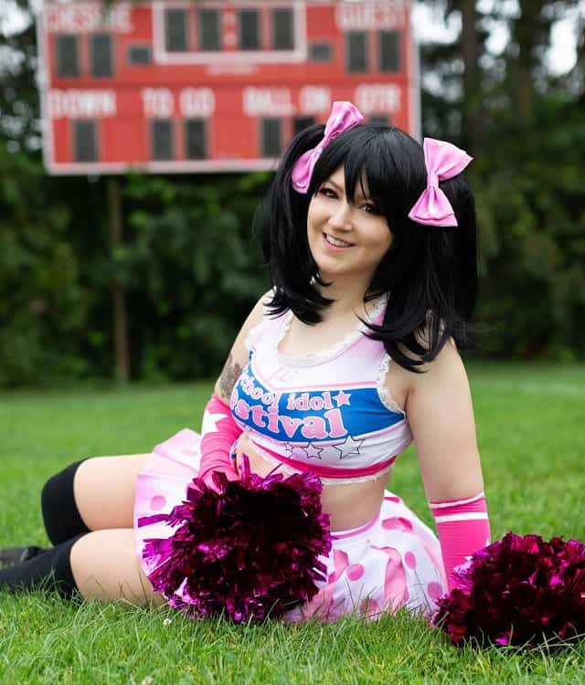 Cheerleader with two ponytail+ bangs