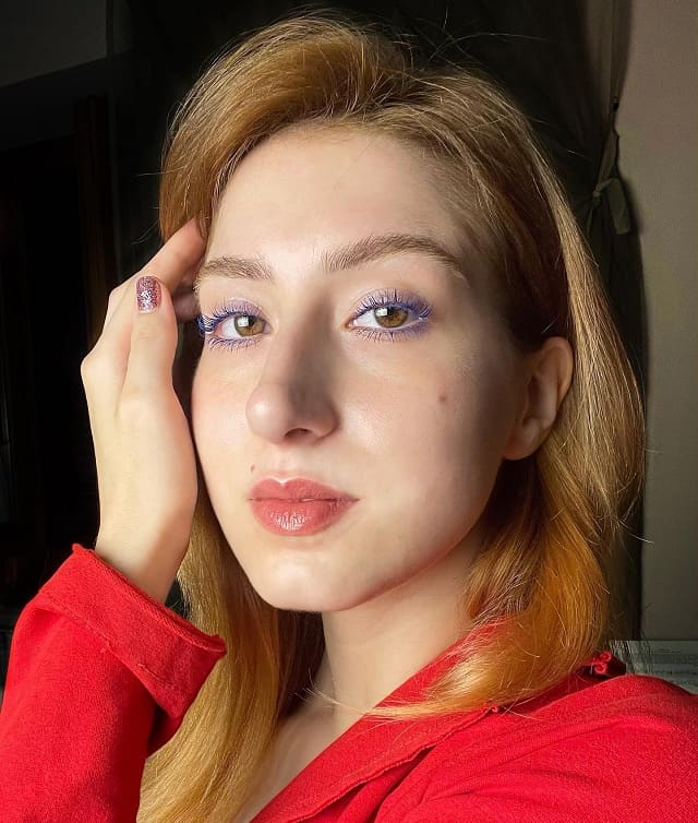 strawberry blonde With Brown eyes