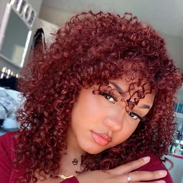27 Trendiest Red Curly Hairstyles For Bold Women