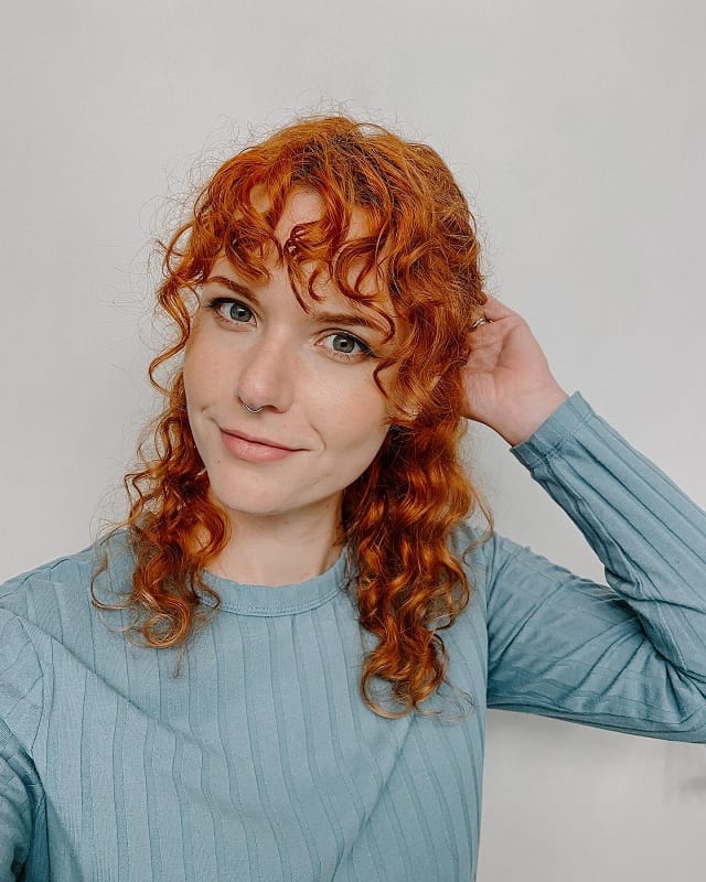 Red curly with bangs