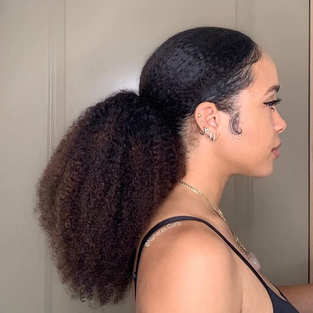 curly ponytail with weave