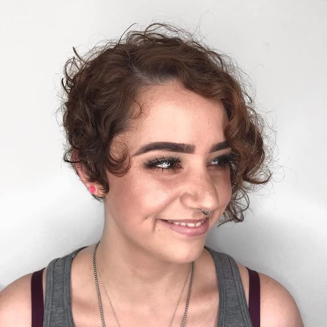 Edgy curly pixie cut